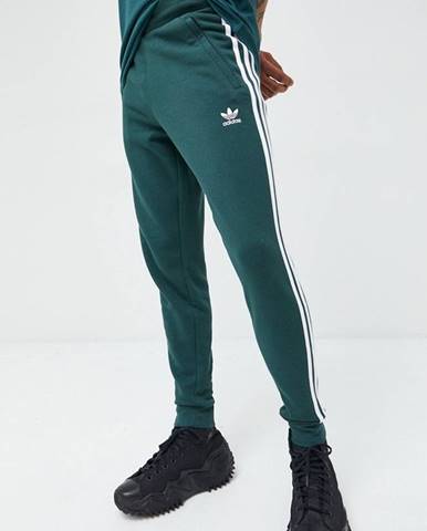 Tepláky adidas Originals pánske, zelená farba, s nášivkou
